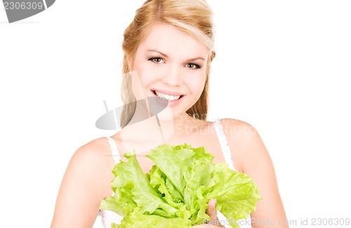 Image of happy woman with lettuce