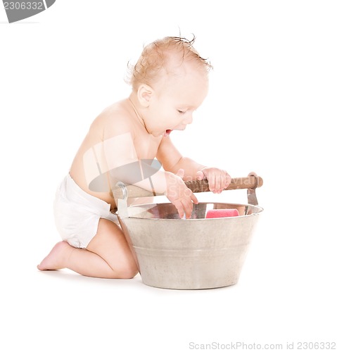 Image of baby boy with wash-tub