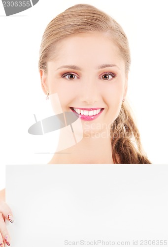 Image of happy girl with blank board