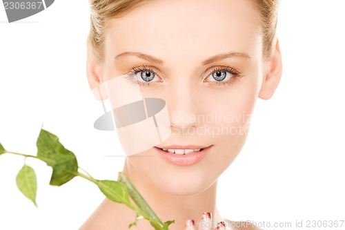 Image of woman with sprout
