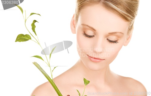 Image of woman with sprout