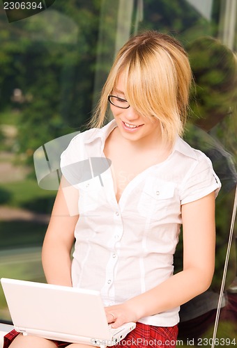 Image of office girl with laptop computer