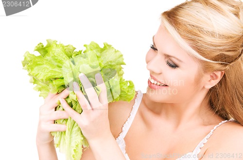 Image of happy woman with lettuce