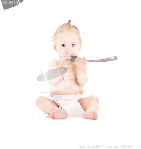 Image of baby boy with big spoon