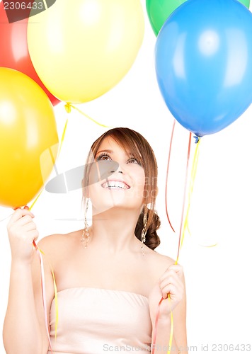 Image of happy teenage girl with balloons