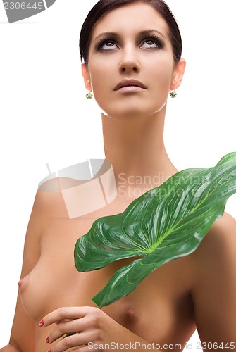 Image of woman with green leaf