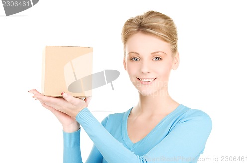 Image of businesswoman with parcel