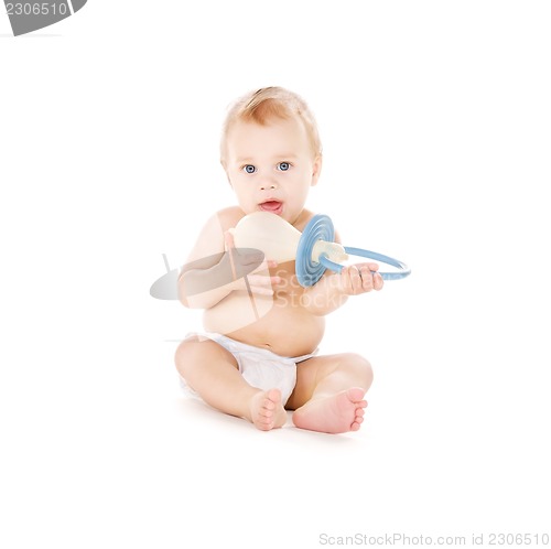 Image of baby boy with big pacifier