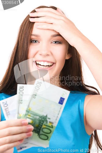 Image of lovely teenage girl with money