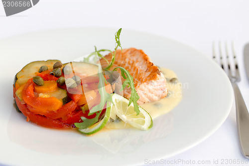 Image of Fish fillet, sauce and vegetables