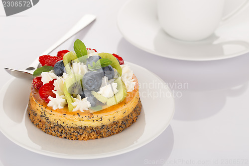 Image of Cheese-cake, strawberry, blueberry and kiwi