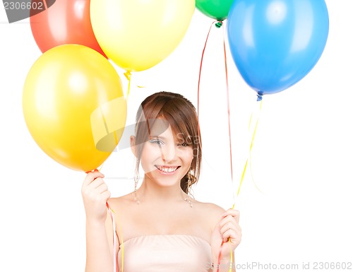 Image of happy teenage girl with balloons
