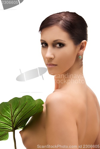 Image of woman with green leaf