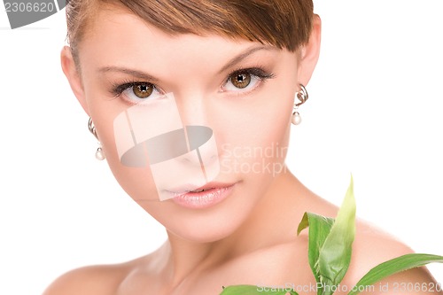 Image of woman with sprout