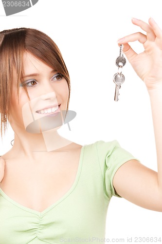 Image of happy teenage girl with keys