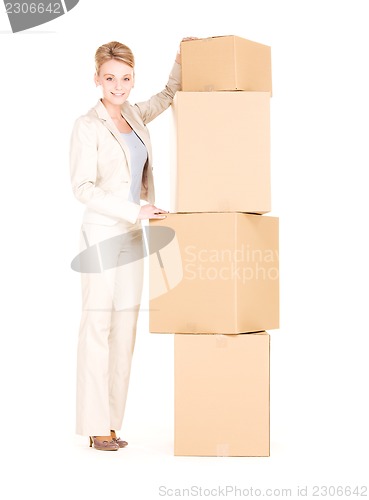 Image of businesswoman with boxes