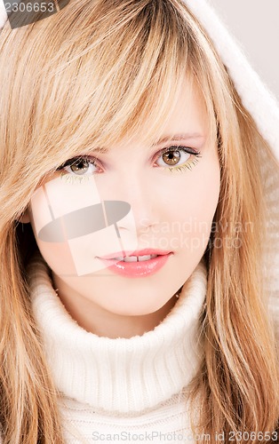 Image of lovely teenage girl in hoodie