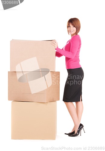 Image of businesswoman with boxes