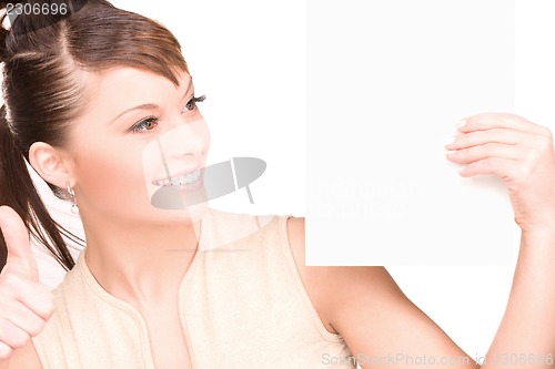 Image of happy woman with blank board