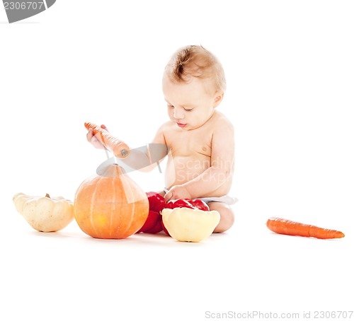 Image of baby boy with vegetables
