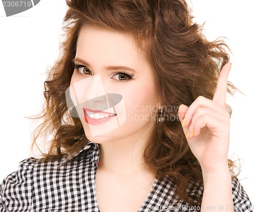 Image of teenage girl with her finger up