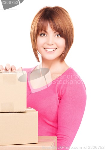 Image of businesswoman with parcels