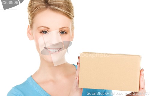 Image of businesswoman with parcel
