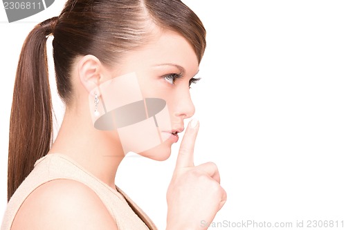 Image of finger on lips