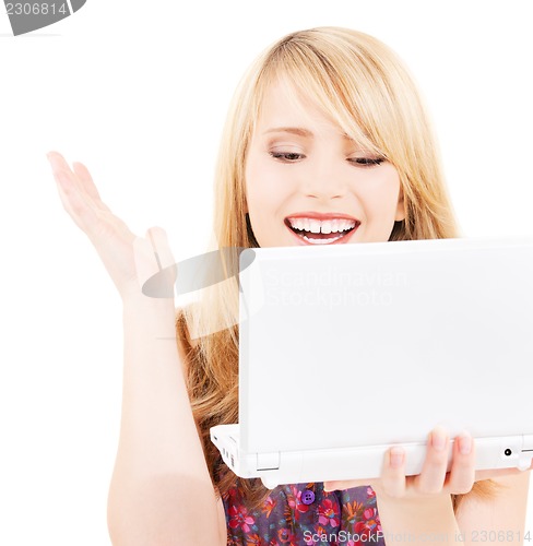 Image of teenage girl with laptop computer