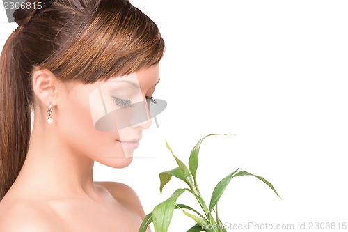 Image of woman with sprout