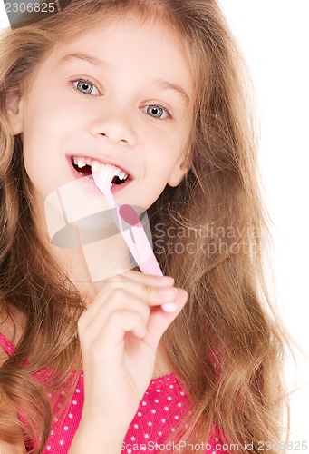 Image of happy girl with toothbrush