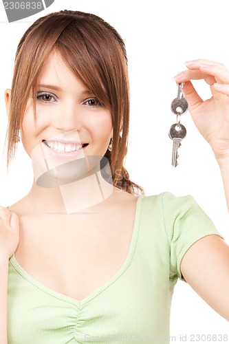 Image of happy teenage girl with keys