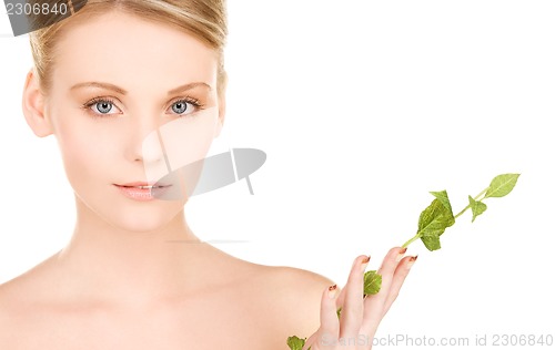 Image of woman with sprout