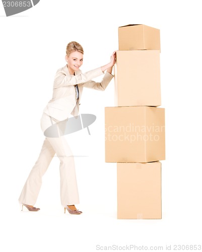 Image of businesswoman with boxes