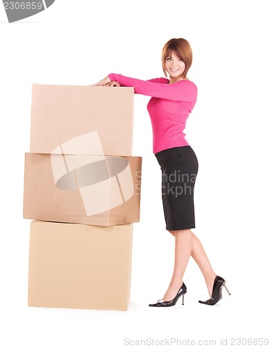 Image of businesswoman with boxes