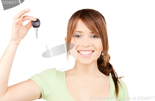 Image of happy teenage girl with car key