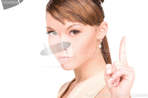 Image of woman with her finger up