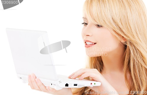 Image of teenage girl with laptop computer