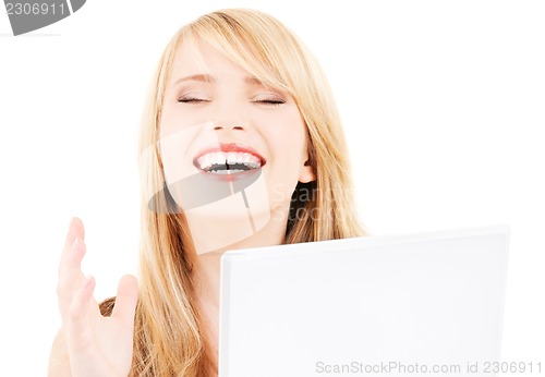 Image of teenage girl with laptop computer