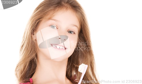 Image of happy girl with toothbrush