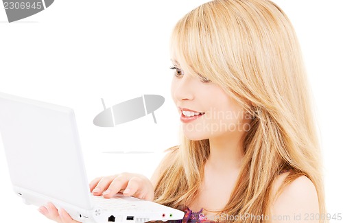Image of teenage girl with laptop computer