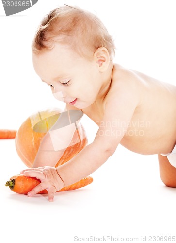 Image of baby boy with vegetables