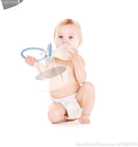 Image of baby boy with big pacifier