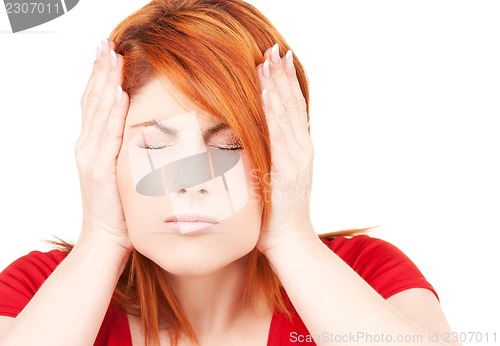 Image of unhappy redhead woman