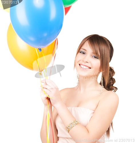 Image of happy teenage girl with balloons