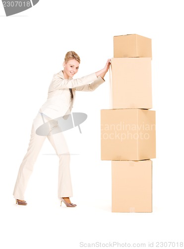 Image of businesswoman with boxes