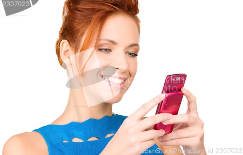 Image of happy woman with cell phone