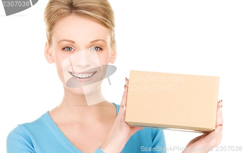 Image of businesswoman with parcel
