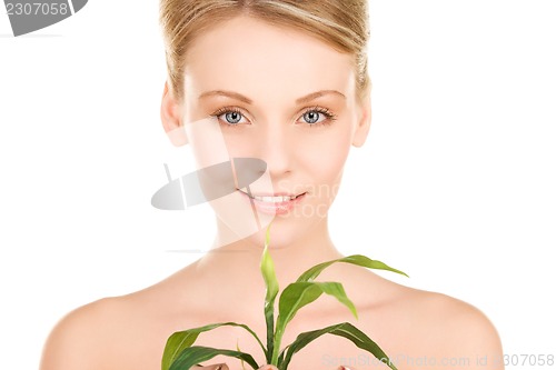 Image of woman with sprout