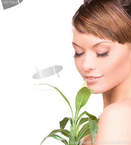 Image of woman with sprout
